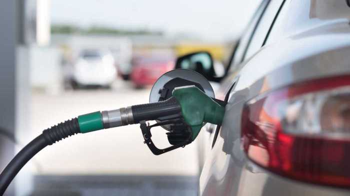 A gas station has a cylindrical fueling tank